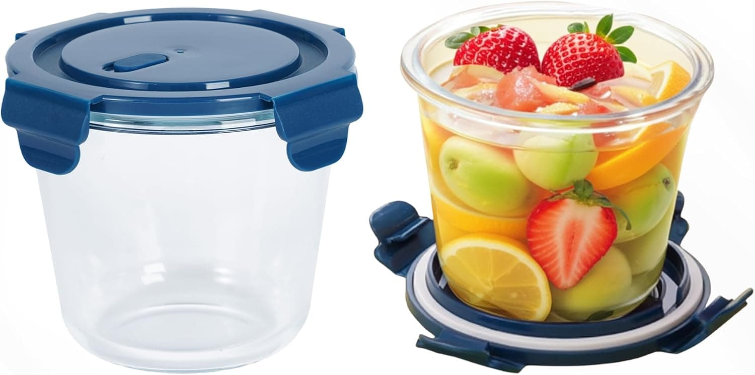 Coco Andrea round glass meal prep containers, one empty and one filled with fruit